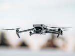 Small Mavic Drone Hovering with Camera