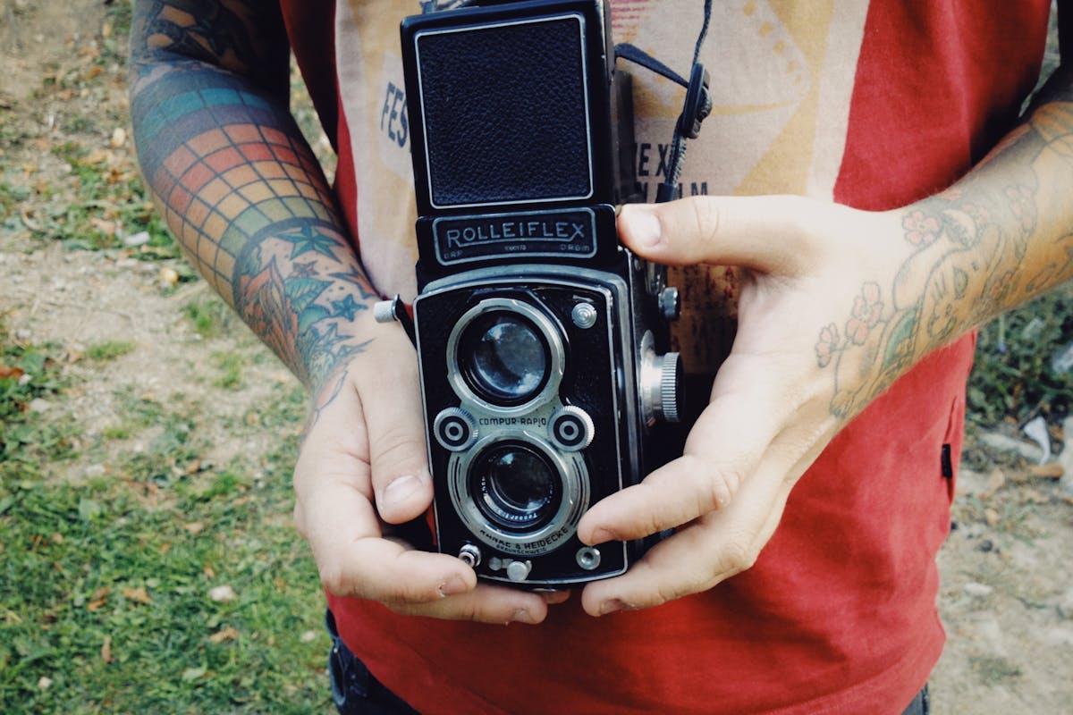 Creamy chicken and greens skillet served in a pan with a spoon, garnished with herbs