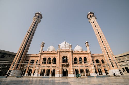 Low Angle Shot of Jamia Masjid Al-Sadiq Under Blue Sky