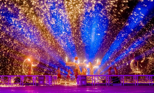 Free Vibrant festival performance with sparks and lights in Changzhou, China. Stock Photo