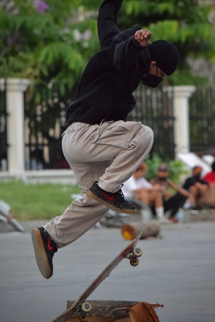 A Skater Doing A Kick Flip