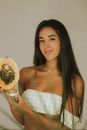 Woman in White and Green Plaid Off Shoulder Top Holding Cupcake