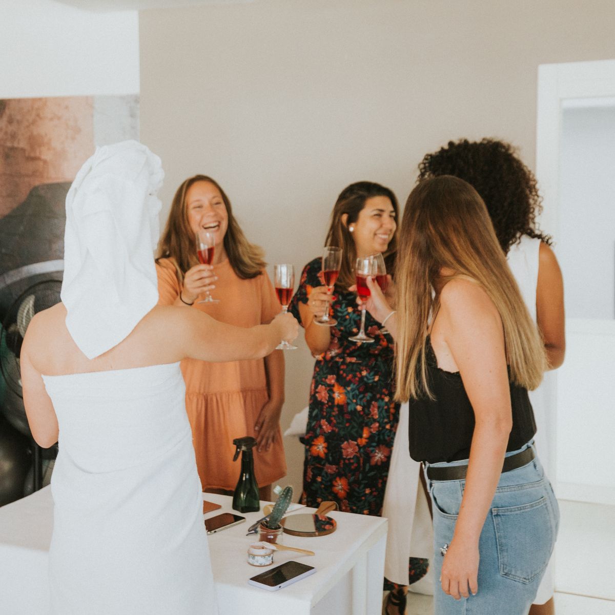 Women toasting during a spa celebration