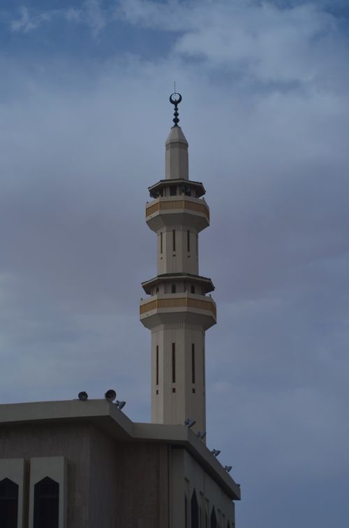 Free Beautiful view of a mosque minaret under a cloudy sky in Hail, Saudi Arabia. Stock Photo