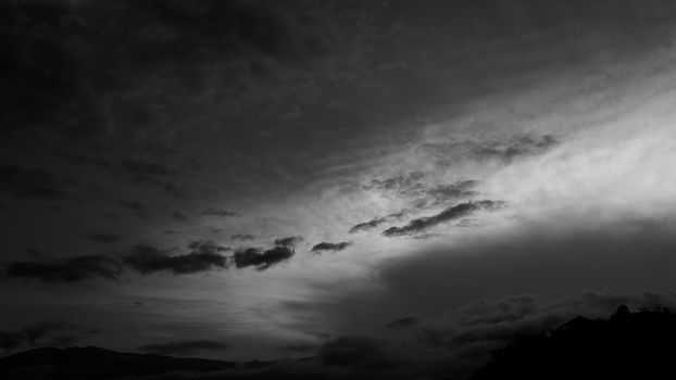 Monochrome clouds creating a dramatic effect in a grayscale sky.