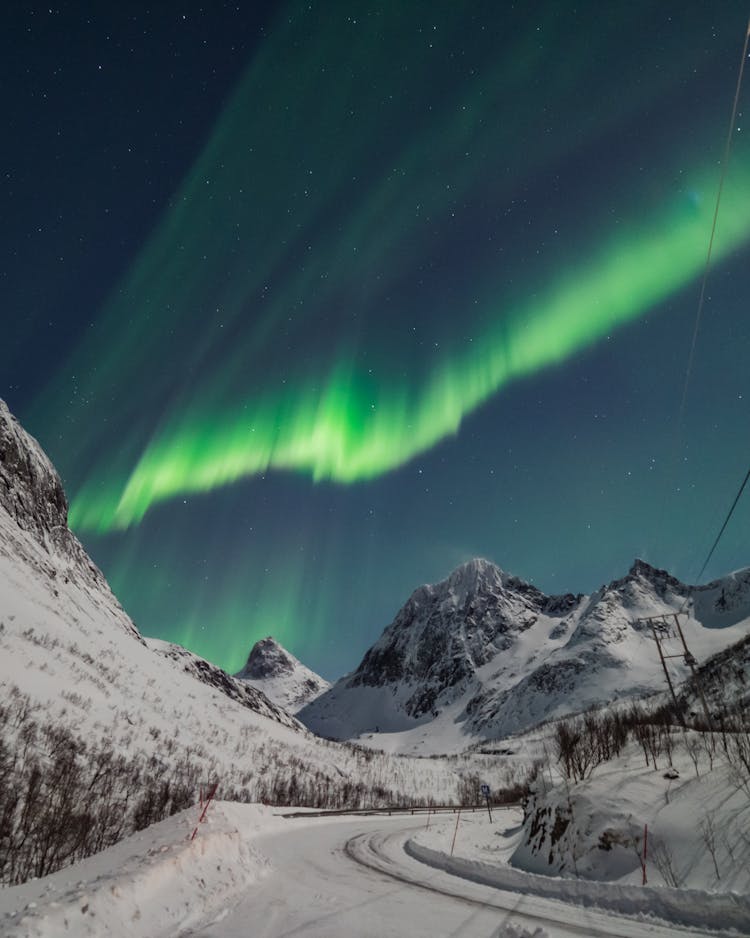 Mountain Landscape With Aurora Borealis Shining In Evening Sky