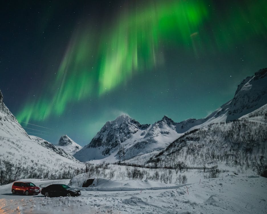 Breathtaking Illumination of Aurora Borealis in Mountains of Northern Norway