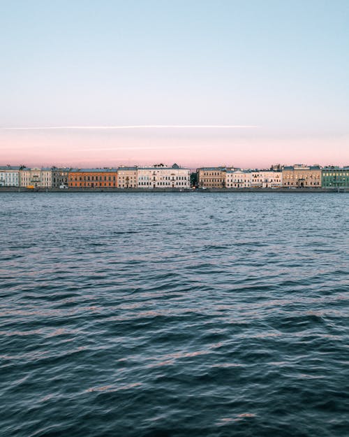 Photo of Waterfront Buildings at Sunset 