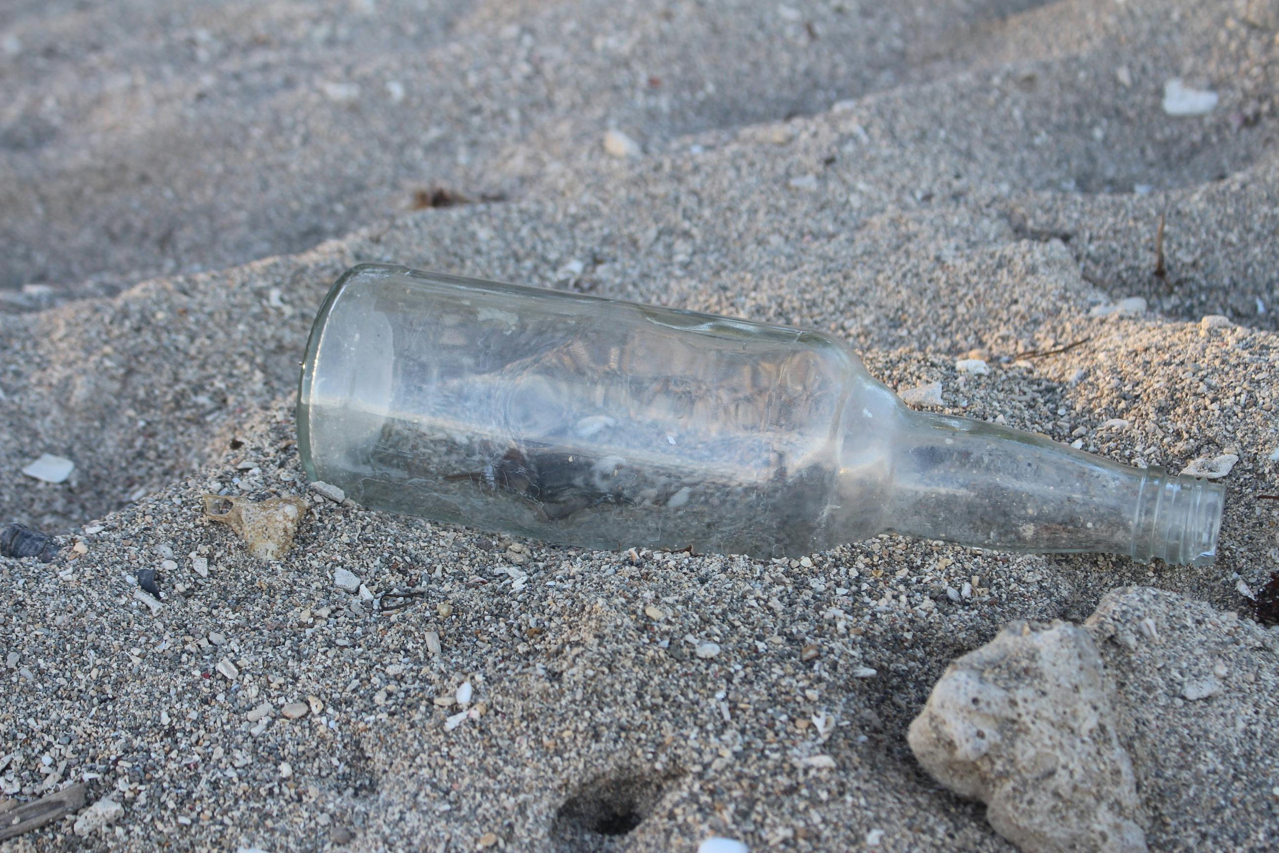 Free stock photo of drifted, glass bottle, sand beach