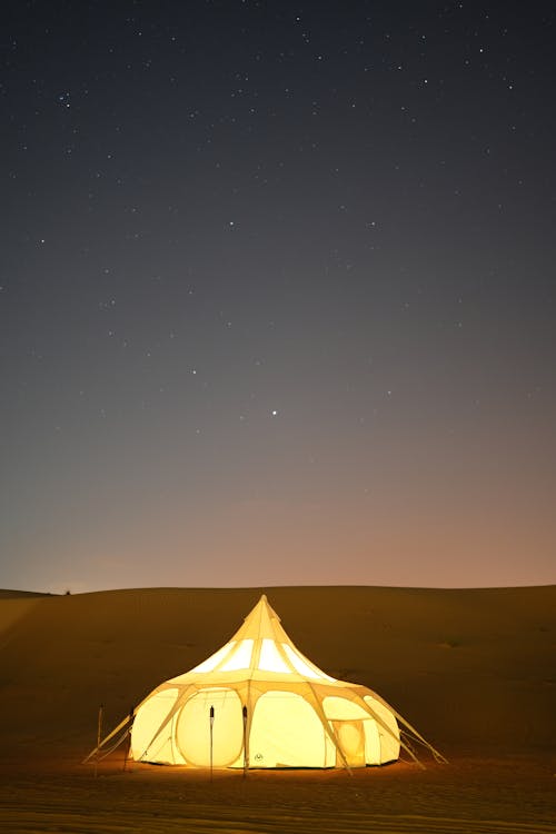 A Tent in a Desert at Night