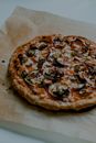 Pizza With Cheese and Green Leaves