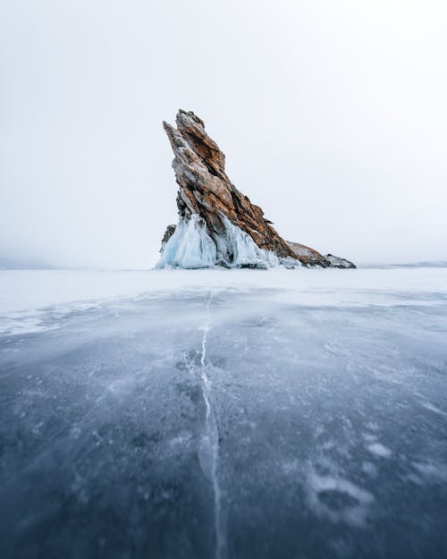 Free Rock on Ice Lake Stock Photo
