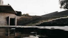 White and Black Concrete House Near Green Grass Field