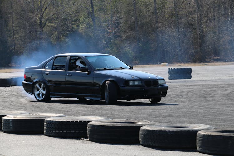 A BMW Car Drifting On A Track