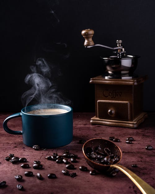 Blue Ceramic Mug With Hot Coffee