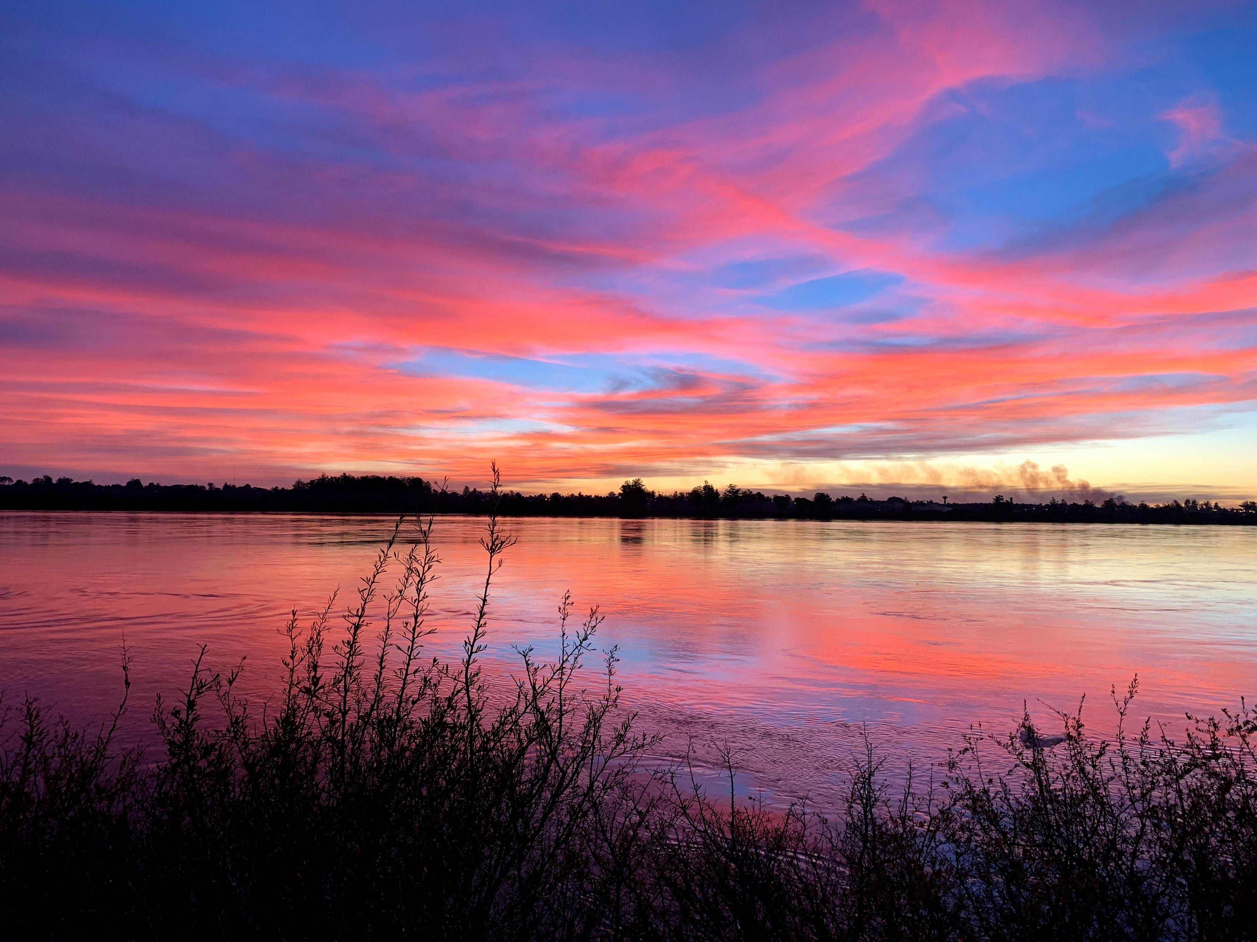 Homeowner reviewing insurance policy documents with professional