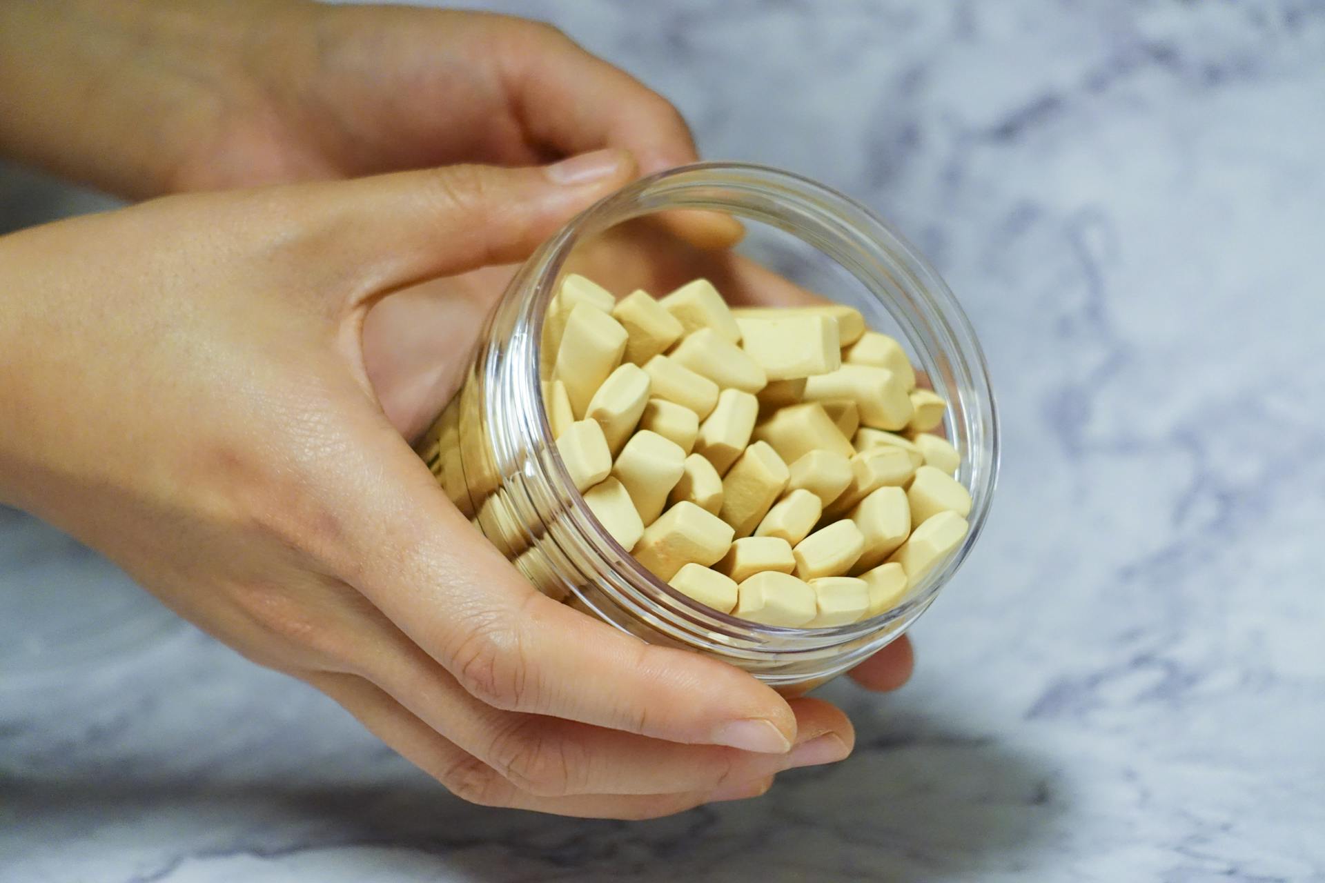 Person Holding Jar