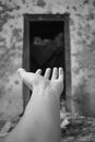 Grayscale Photo of a Hand