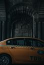 Yellow Taxi Cab in a Tunnel