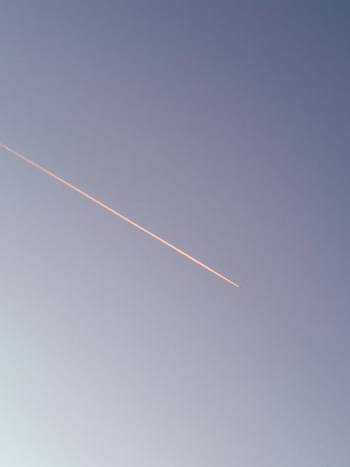 Free Jet Contrail in The Sky Stock Photo