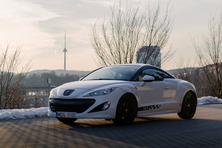 A White Peugeot RCZ