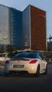 Silver Bmw M 3 Coupe Parked Near Brown Building