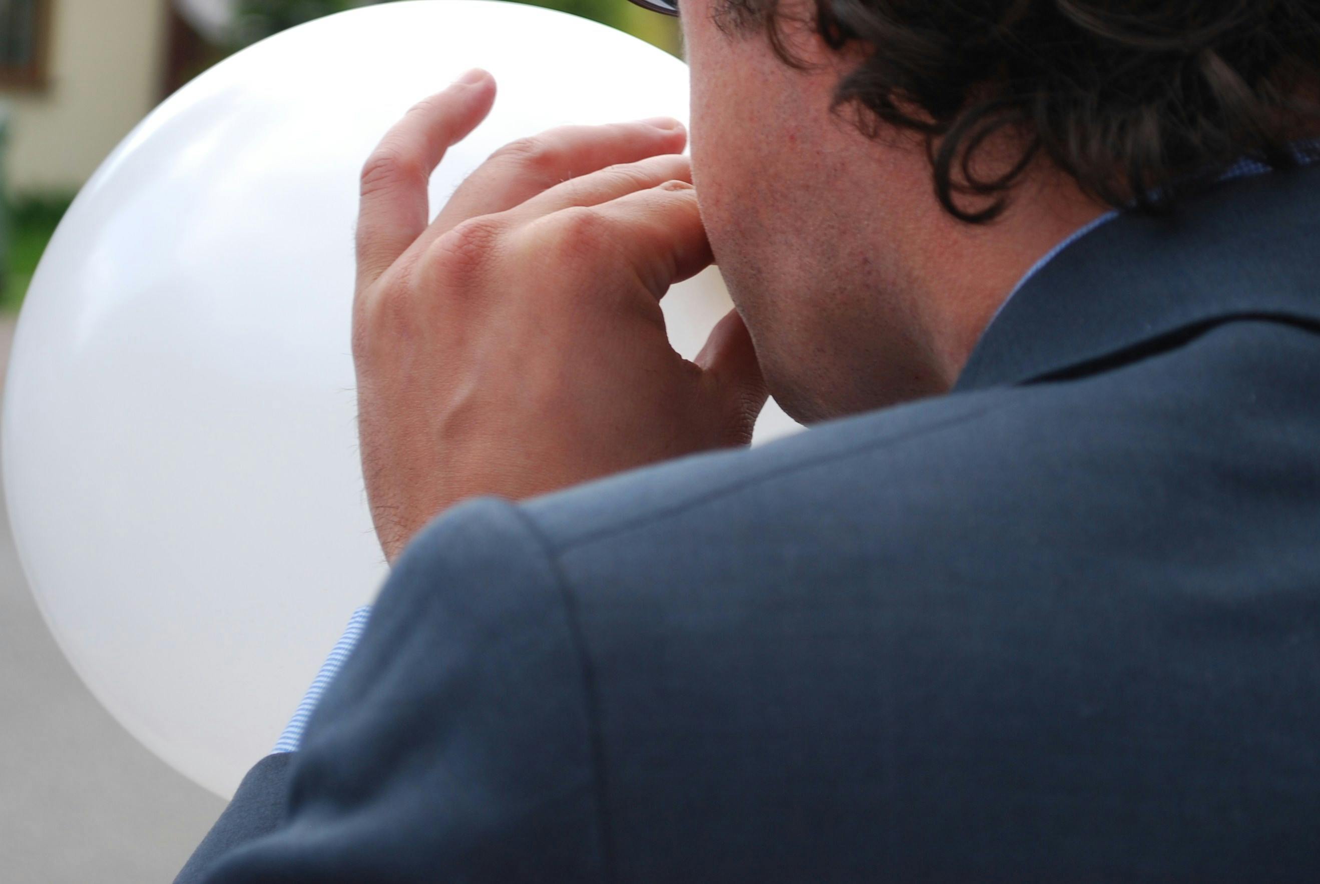 Free stock photo of balloon, blowing up, man