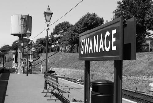 Free stock photo of black and while, swanage, train station