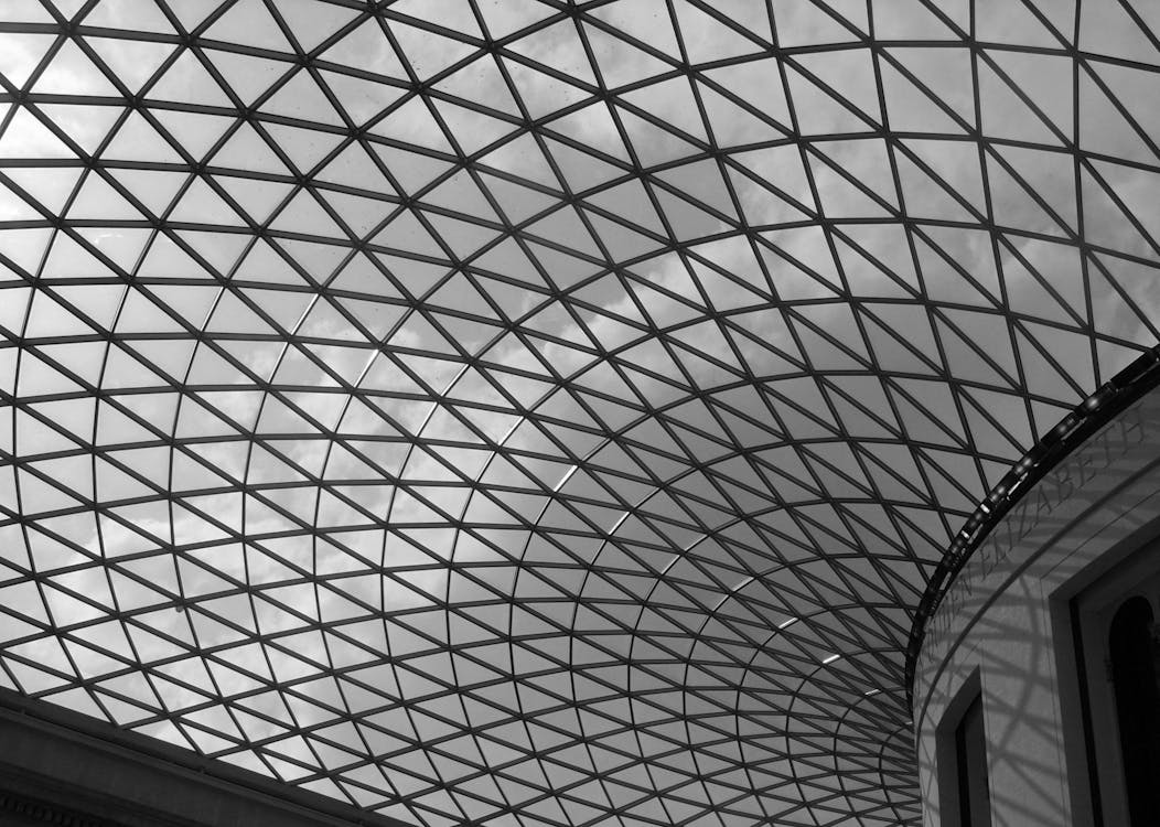 Gray Scale Photo of Glass Dome Building