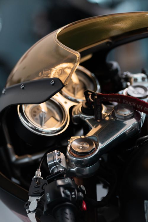 Free Detailed image focusing on motorcycle dashboard with handlebar and windshield. Stock Photo