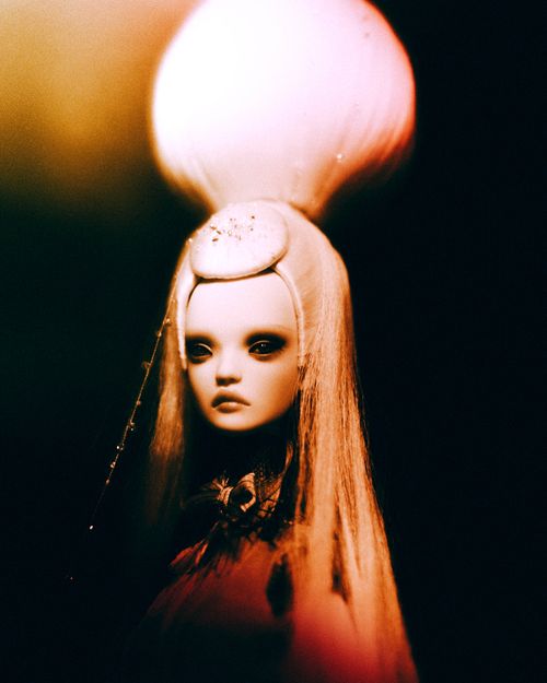 Free Close-up of an artistic doll with dramatic lighting, evoking an ethereal and moody atmosphere. Stock Photo