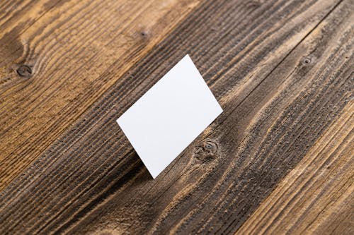 A Blank Card on a Wooden Surface 