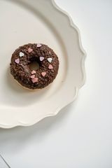 Scalloped white ceramic plate, photo by Olena Bohovyk on Pexels