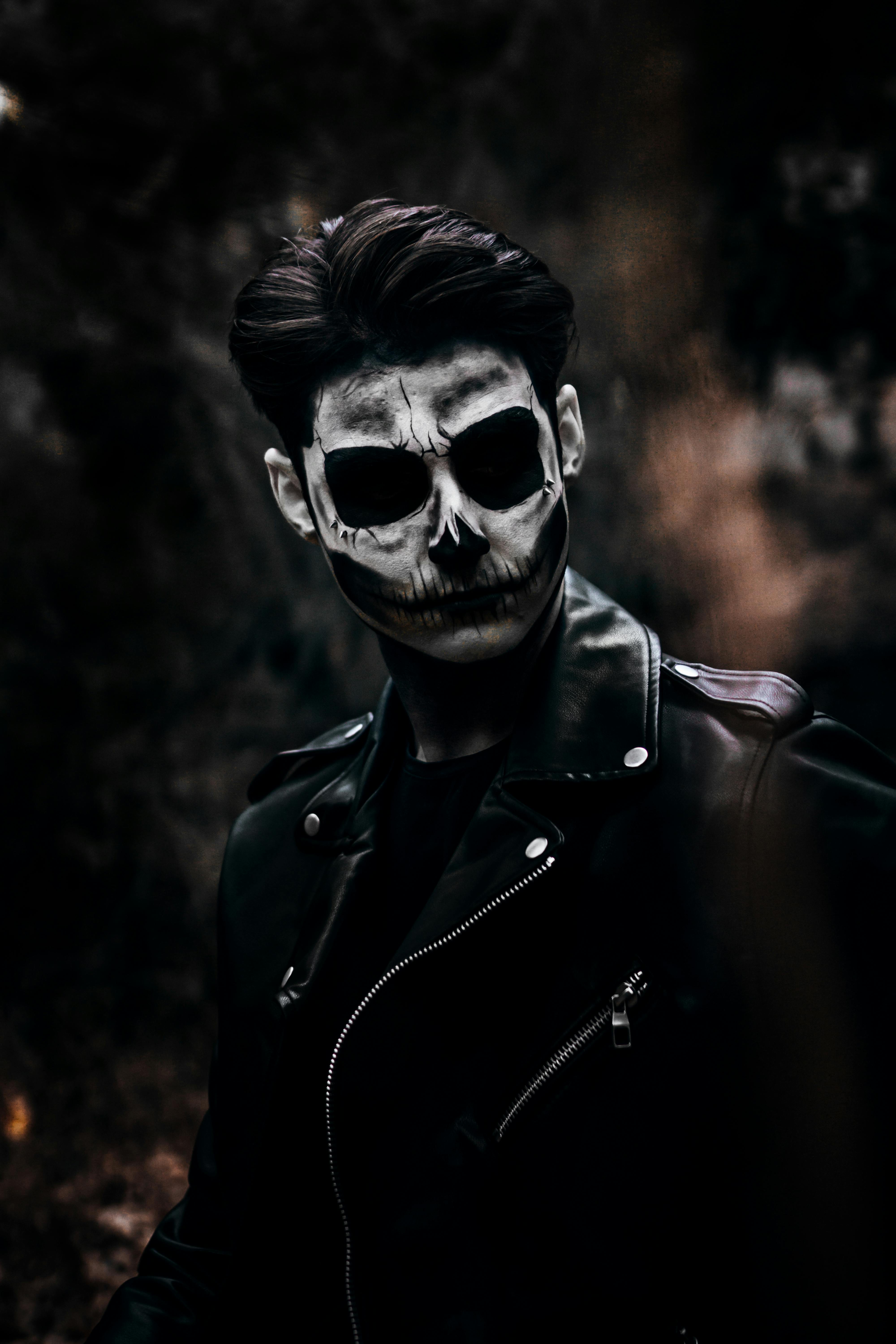 Man in Black Leather Jacket Skull Face Paint · Free Stock Photo