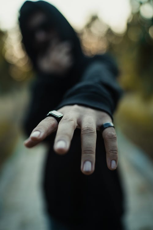 A Person Wearing Silver Ring
