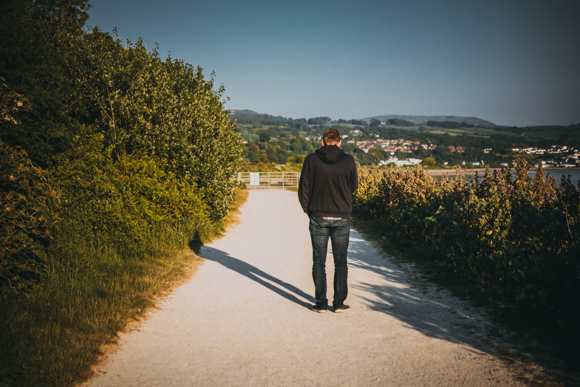 ADHD anger outbursts adhd & emotions adhd — person walking alone outside path trees calm afternoon light