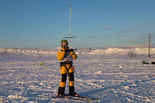 A Snowkiter Holding onto a Kite