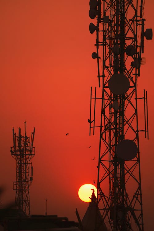 Silhouette of a Cell Tower during Sunset