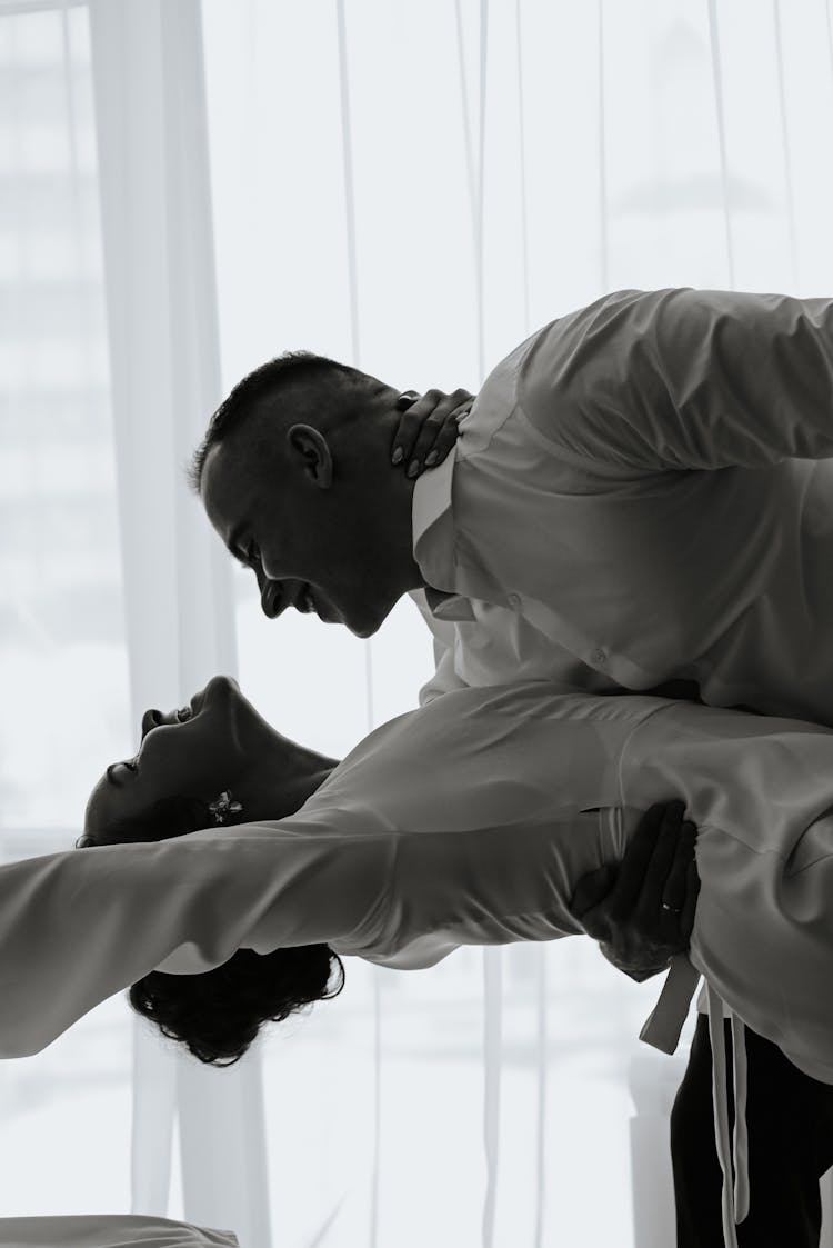 Happy Couple Dancing Indoors