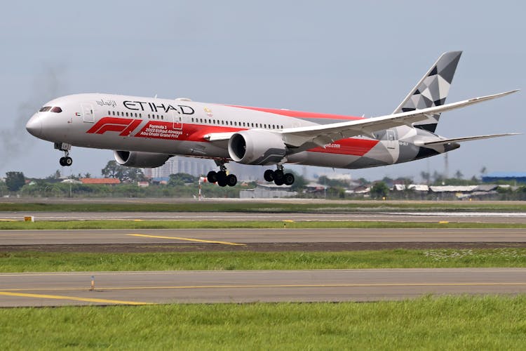 An Airplane Landing On Runway