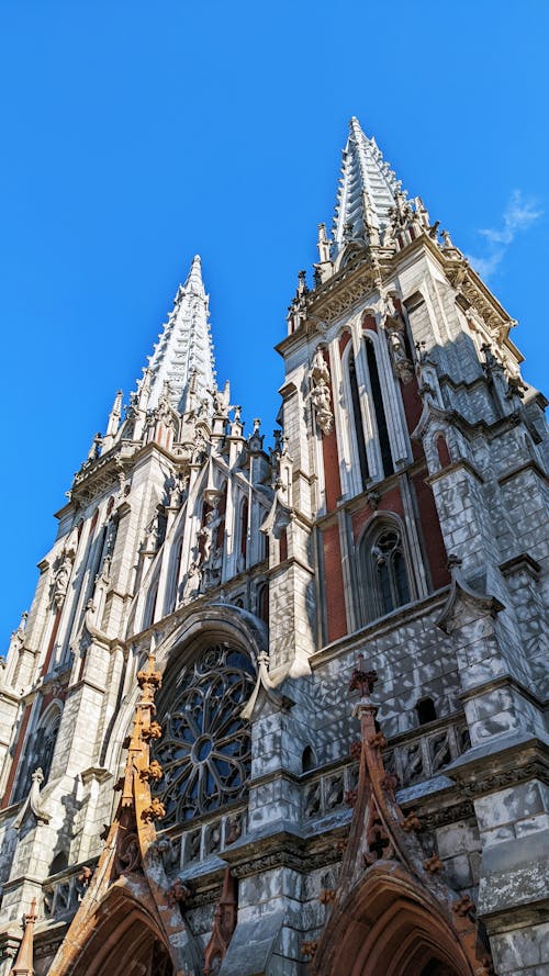 Kostenloses Stock Foto zu aufnahme von unten, außendesign, blauer himmel