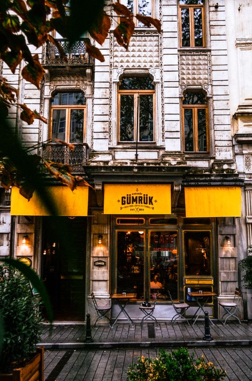 Free Exterior of a cozy Istanbul cafe with a historic facade and vibrant atmosphere. Stock Photo