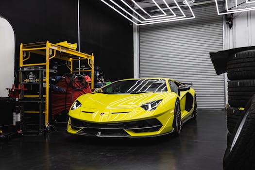 A striking yellow Lamborghini Aventador parked indoors showcasing luxury and sleek design.