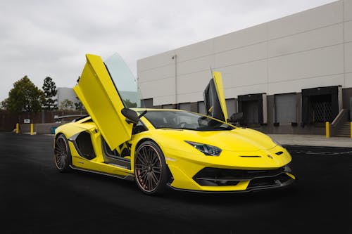 Yellow Car Parked on the Road