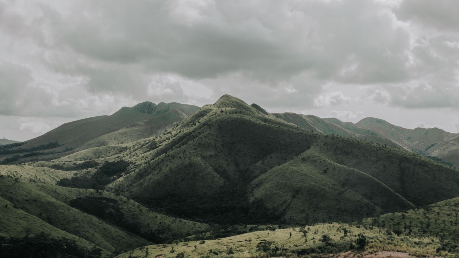 Green mountains under white clouds, Angola