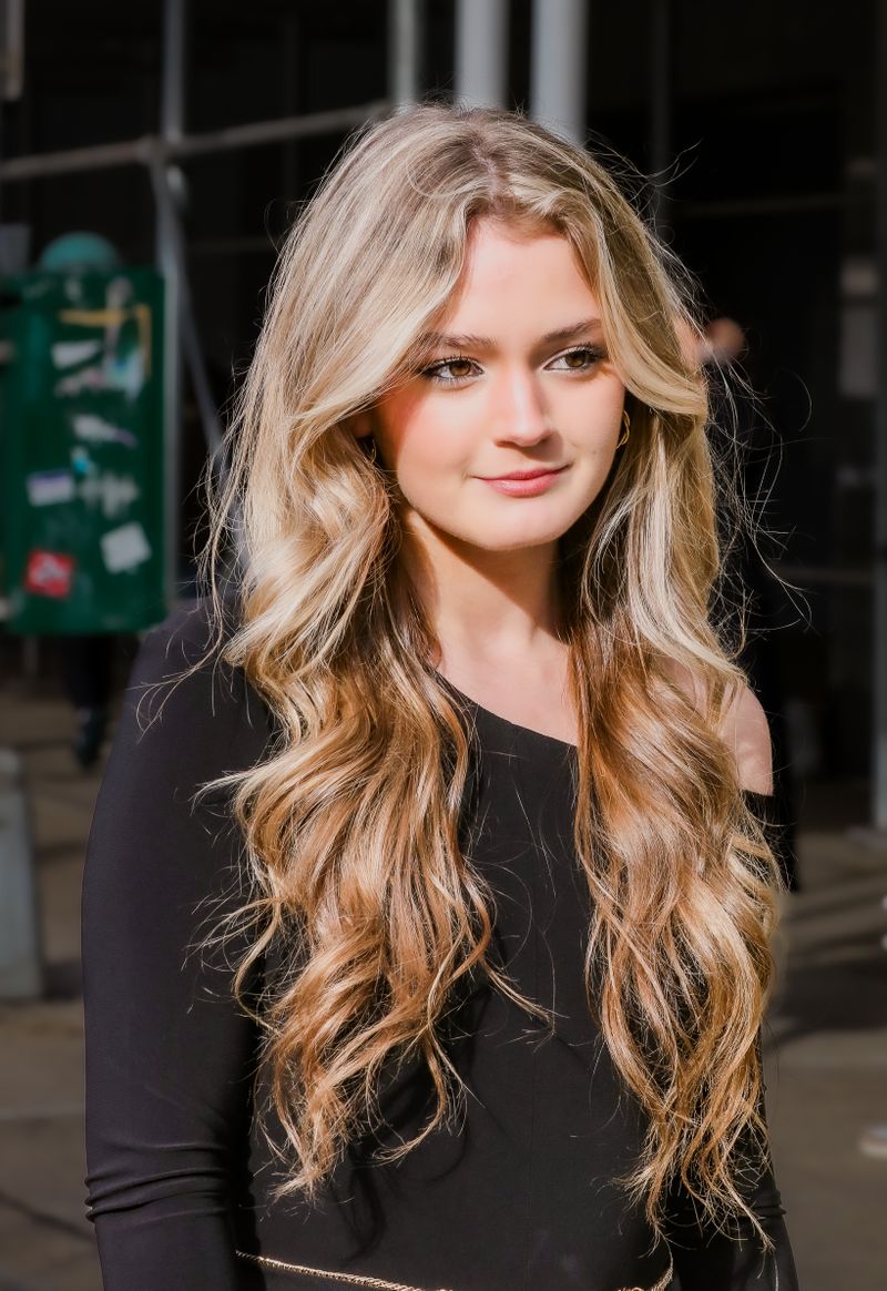 Woman with long wavy blonde hair in New York City