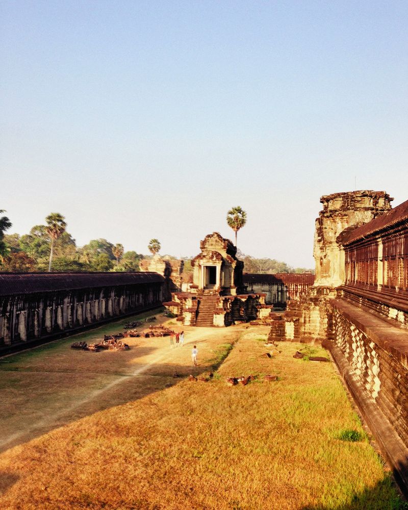 Angkor Wat temple ruins under a clear blue sky in Siem Reap, Cambodia