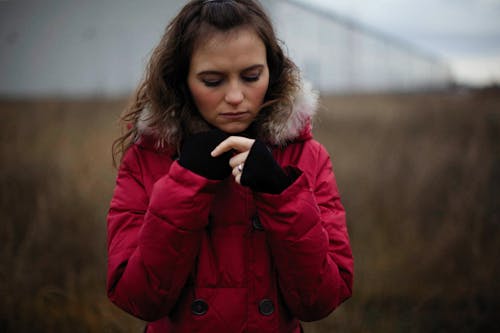 A Woman in Red Jacket