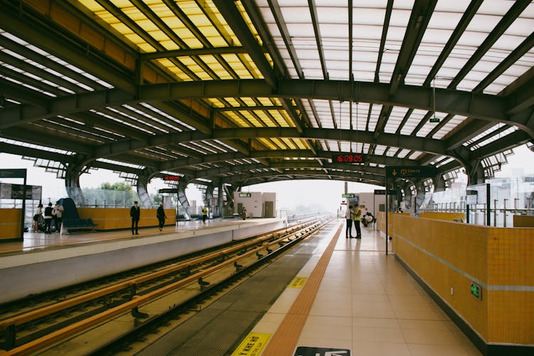 People Walking On Train Station