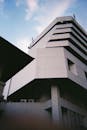 Gray Concrete Building Under the Blue Sky